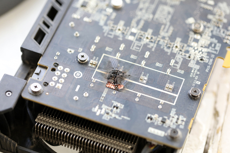 Closeup view of damaged graphic, adapter burnt outの写真素材