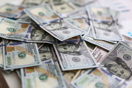 Big pile of US money lying down in random orderの写真素材