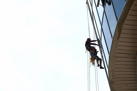 Man cleaning windowsの写真素材