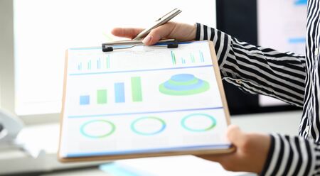 Business lady with documentationの写真素材