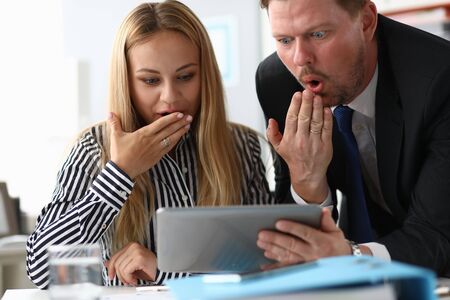 Surprised business workersの写真素材
