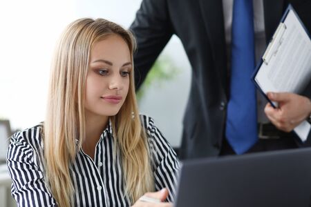 Business lady writing somethingの写真素材