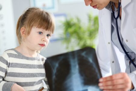 Kid patient in having doctors appointmentの写真素材