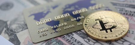 Gold coin bitcoin closeup lie on tableの写真素材