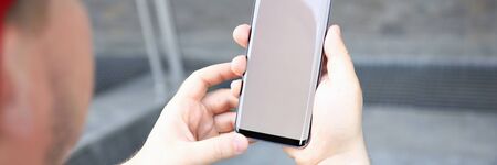 Smartphone hand hold electronic wirelessの写真素材