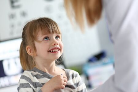 Cheerful kid at doctors appointmentの写真素材