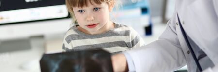 Little patient having x-ray examinationの写真素材