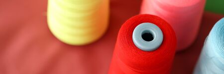 Multicolored spools of thread