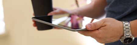 Man surfing internet via modern gadget