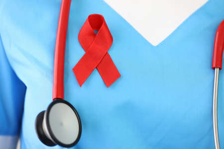 Doctor has red ribbon on his chest.の写真素材