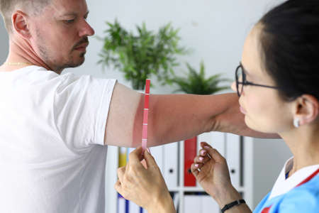 Healthcare professional determines the extent of patients burn.