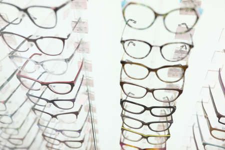 Showcase with glasses in optics salon closeupの写真素材