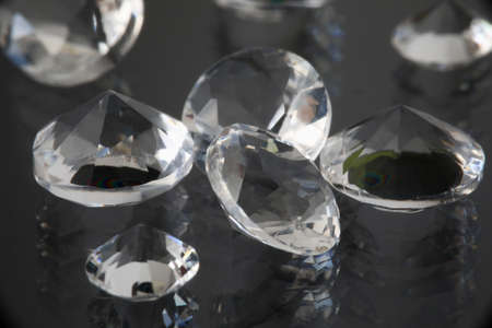 Precious expensive stones lie on black backgroundの写真素材