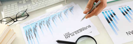 Drawing up and planning a business plan for 2021 closeup.