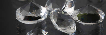 Precious expensive stones lie on black backgroundの写真素材