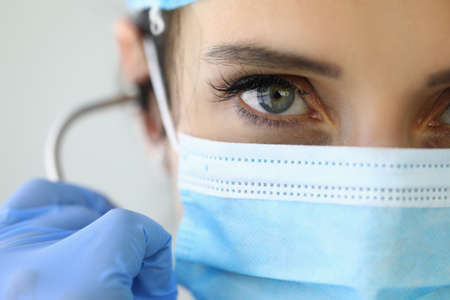 Confident look doctor in protective medical mask.の写真素材