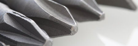 Metal heads for gray screwdriver or screwdriver closeup.の写真素材