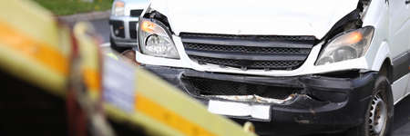 Car after an accident calls in on tow truckの写真素材