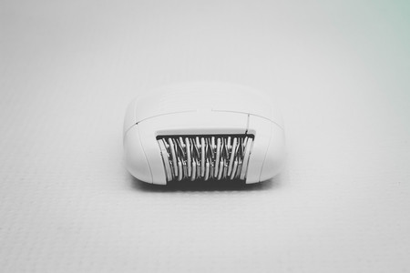 Modern epilator on whiteの写真素材