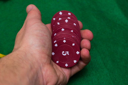 Casino chips and Dealer on top