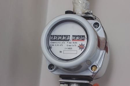 Indoor gas meter used for measuring natural gas consumption in buildings houses.の写真素材
