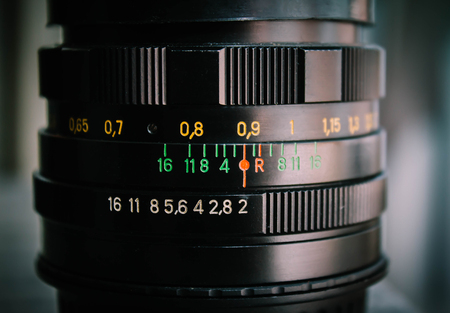Macro shot of a camera lens focusing on camera lens information the aperture size backgroundの写真素材