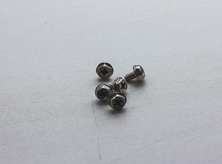 Nuts and bolts on black background.の写真素材