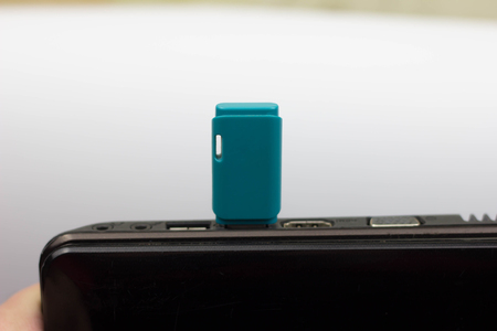 USB flash drive and laptop oneの写真素材