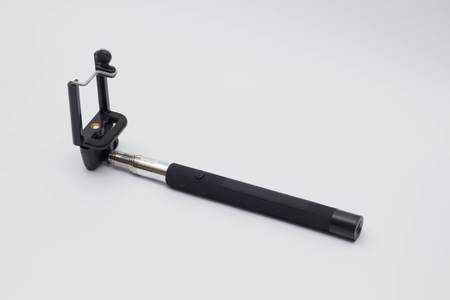 selfie stick isolated on white backgroundの写真素材