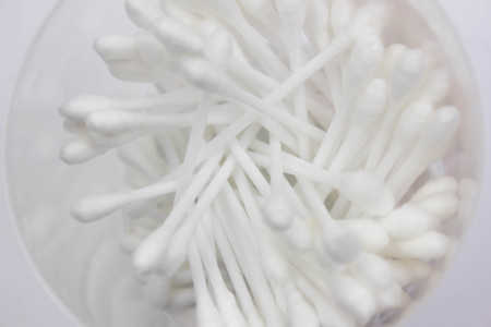 White cotton-tipped swabs. Ear sticks close up. Soft focus image beautyの写真素材