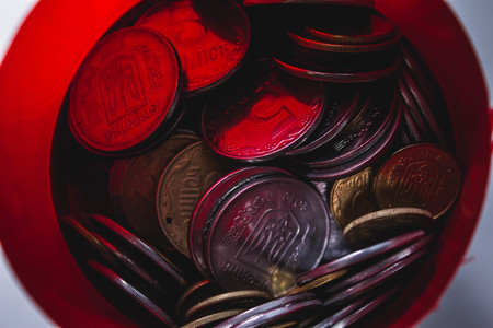 many old dirty pennies. bronze and copper pennies scattered on the table or floorの写真素材