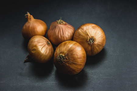 elegant onion on black background foodの写真素材