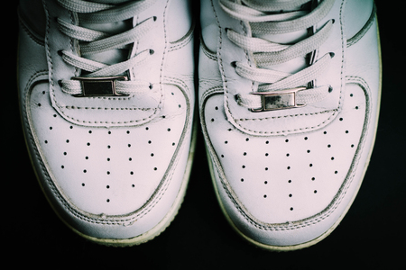 White Sneakers isolated on black background sportの写真素材