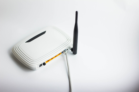 white router on a white background internetの写真素材