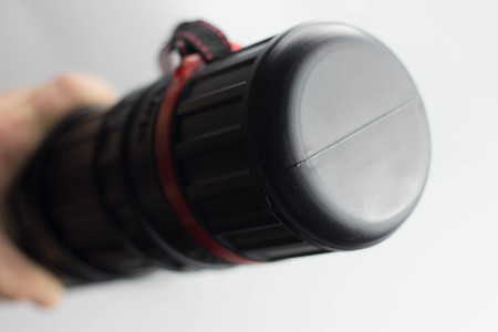 Tube for drawings on white background paperの写真素材