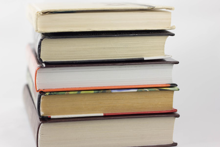 A stack of books on a white background colorの写真素材