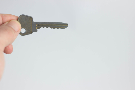Set Of Keys On Human Palm Isolated On White Background houseの写真素材