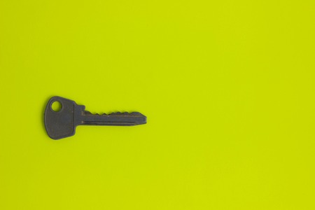 overhead of many different keys in oder on yelow background concept metalの写真素材