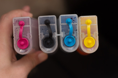 colorful liquid in plastic opaque bottles