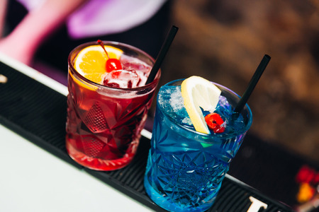 colourful cocktails with cherriesの写真素材