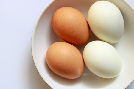 egg in bowl, top viewの写真素材