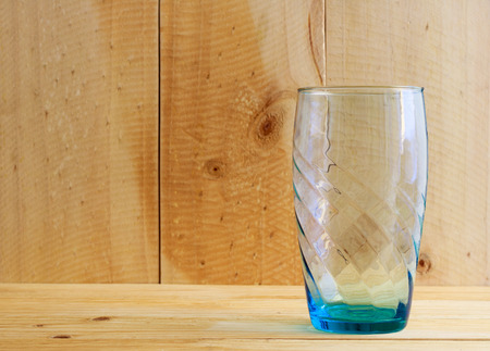 Blank glass jar on wooden tableの写真素材