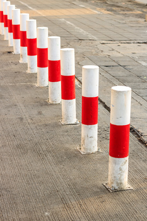 Road block pole in straight line,no entry for automobilesの写真素材