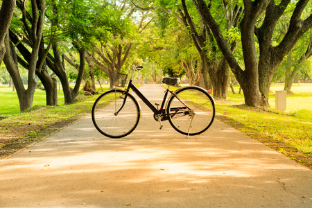 Vintage bicycle parked on the road.の写真素材