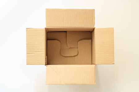 Opened brown paper carton box isolated on white background. Top view.の写真素材