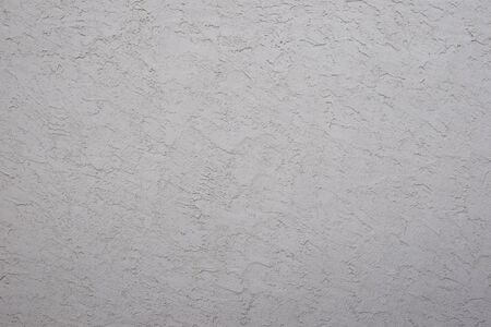 White plaster stucco wall background textureの写真素材