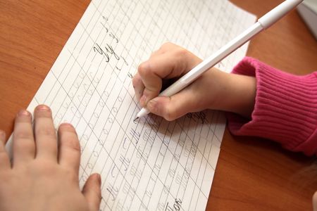 little girl writing