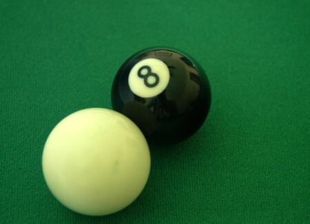  Two pool balls on the table ready for play