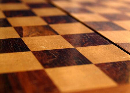 squares on a portable chess board ready for a game