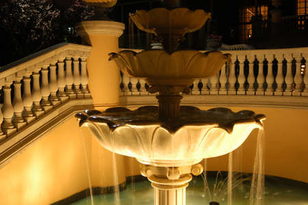 Night view of a water fountain at a resortの写真素材
